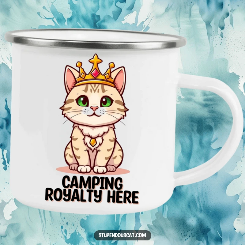Funny camping mug showing a regal cat in a golden crown confidently surveying its domain in an outdoor setting.