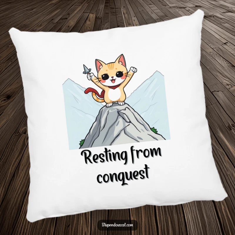 Funny pillow featuring a heroic cat character striking a pose on a mountaintop, adding humor and adventure to decor.