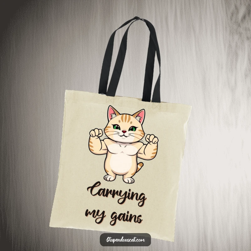 Funny tote bag displaying a strong cat with rippling muscles, flexing its arms with immense pride.