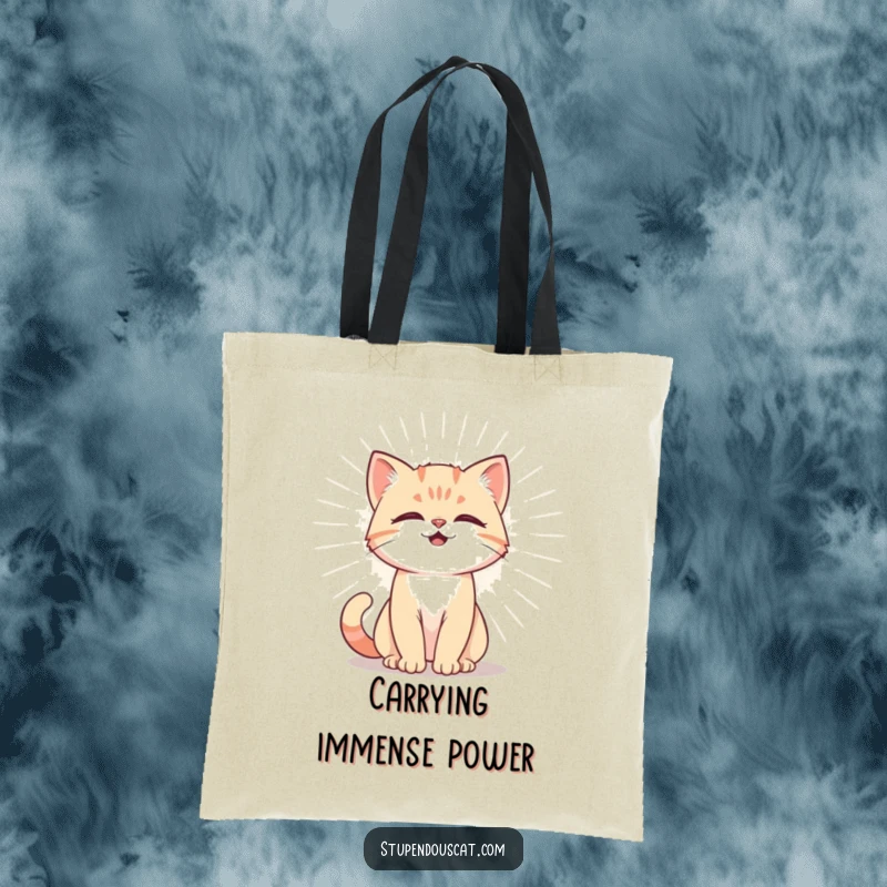 Funny Tote Bag showing a powerful cat cub emitting a radiant aura, perfect for carrying items with a dose of majestic, humorous energy.
